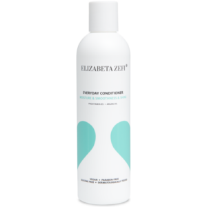 Weiße Flasche eines Conditioners mit blauer und schwarzer Schrift.